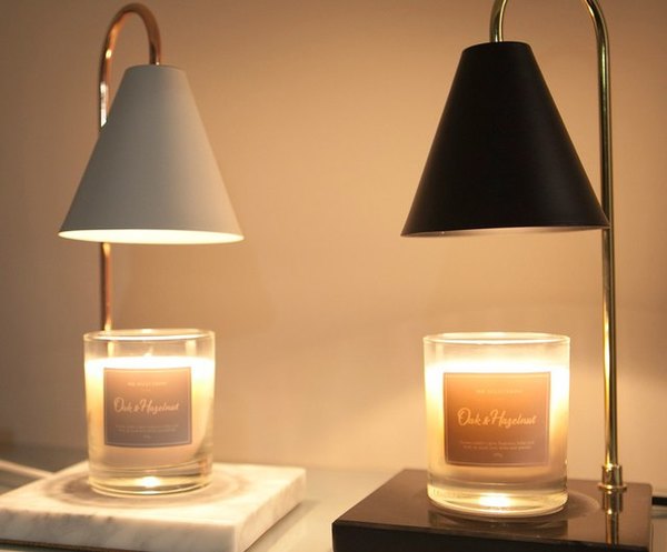 Candle warmers use electricity to warm the wax and do not require any fire.