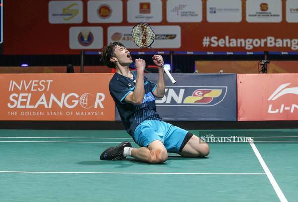 Ng celebrating after downing Ikhsan in the second singles game.