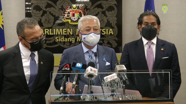 From left to right: Senior Defence Minister Datuk Seri Hishammuddin Hussein, Prime Minister Datuk Seri Ismail Sabri Yaakob, and Health Minister Khairy Jamaluddin.